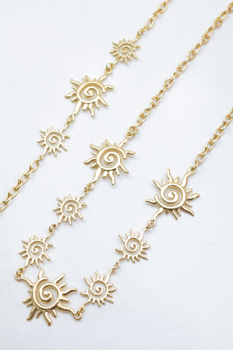 Parure collier et bracelet soleils spirales