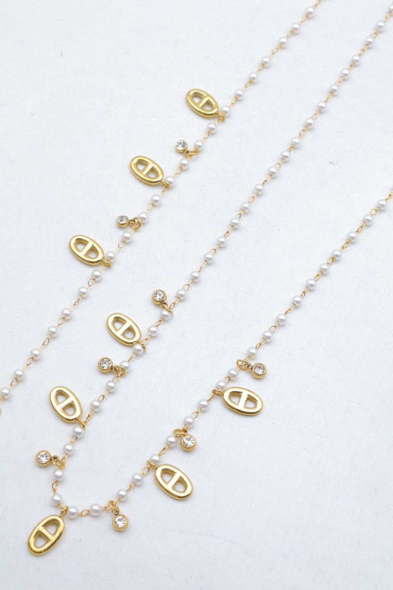 Schmuckset aus edelstahl mit maritimen gliedermustern und eingefassten strassanhängern