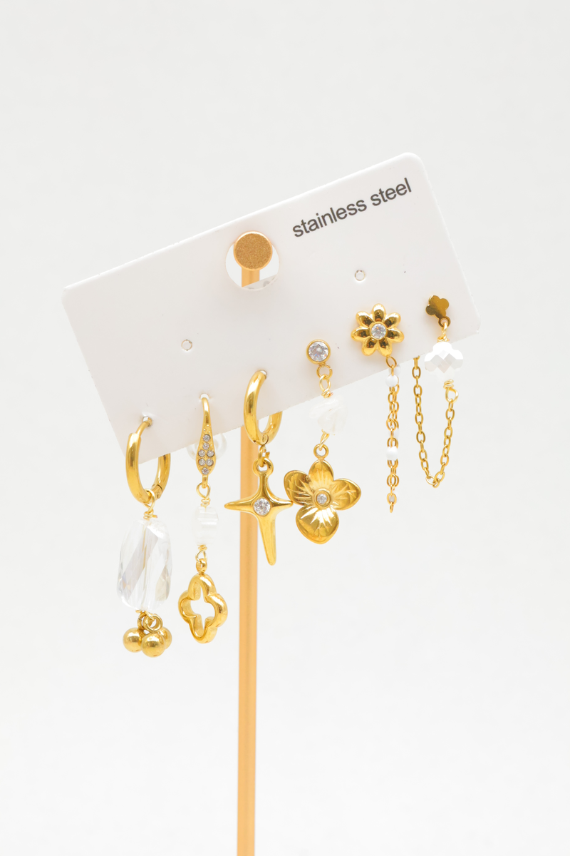 Set aus 6 ohrringen und steckern aus edelstahl mit blumen-, stern- und perlenmotiven