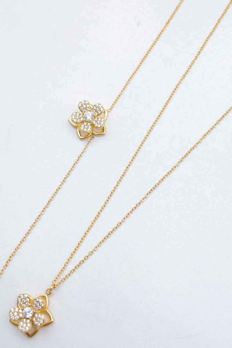 Parure collier et bracelet fleur pivotante