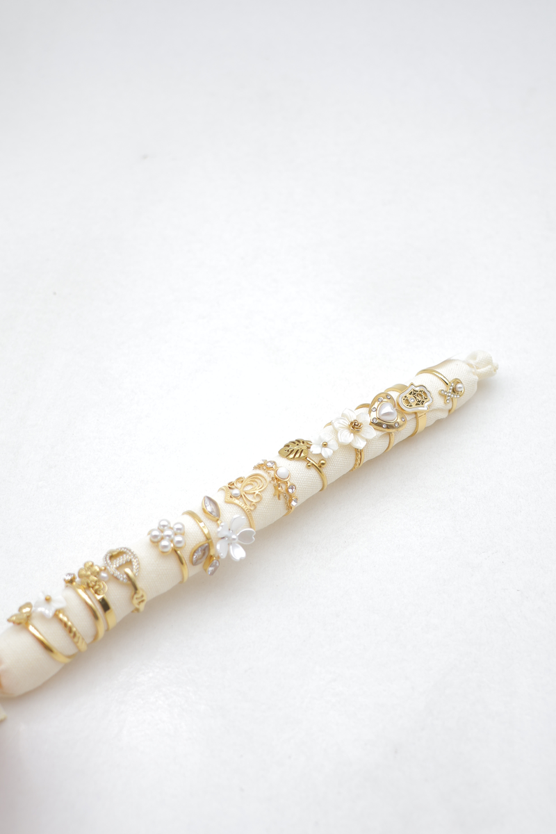 Rouleau de 12 bagues assorties