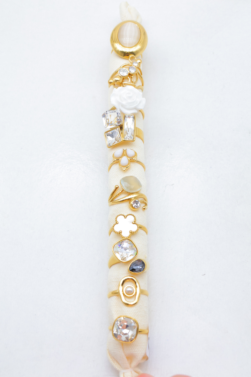 Set of 10 assorted rings on cushion roll