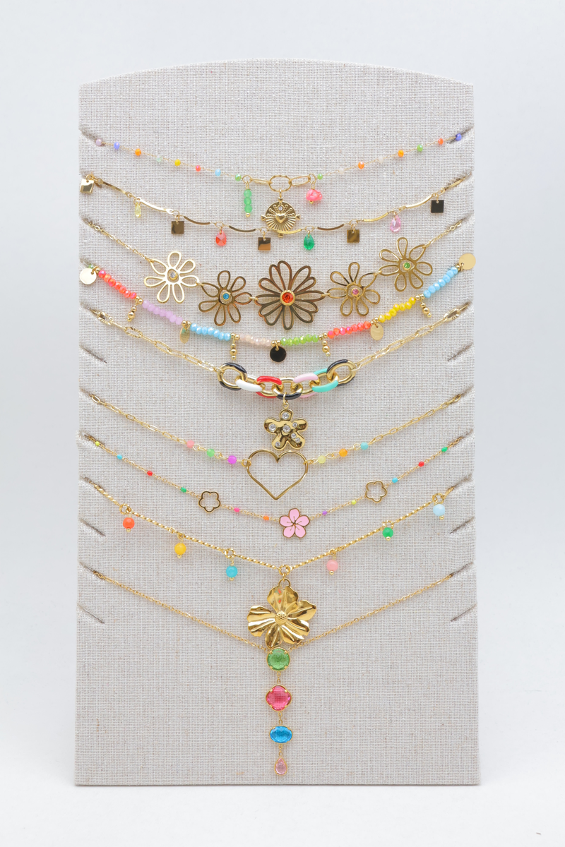 Set of 9 multicolored stainless steel necklaces, displayed on a linen stand — Multicolor