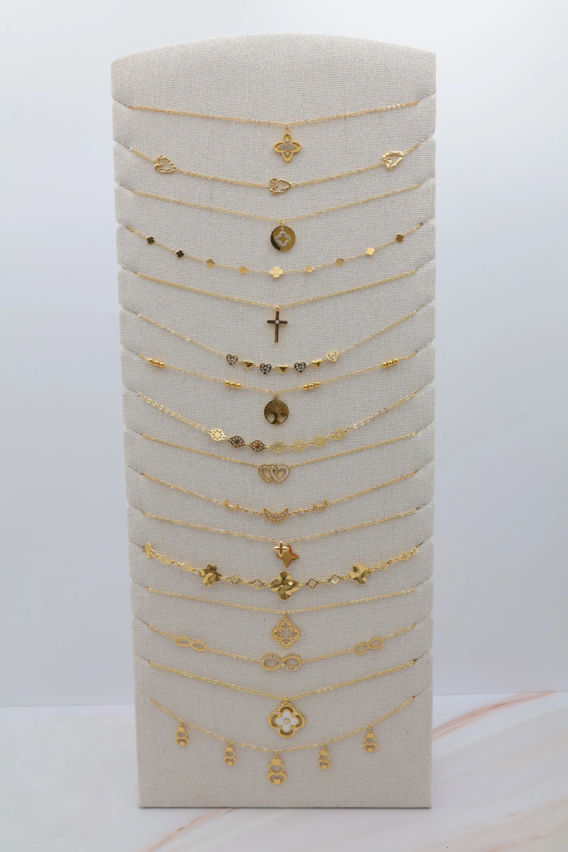 Set of 16 stainless steel necklaces with display stand