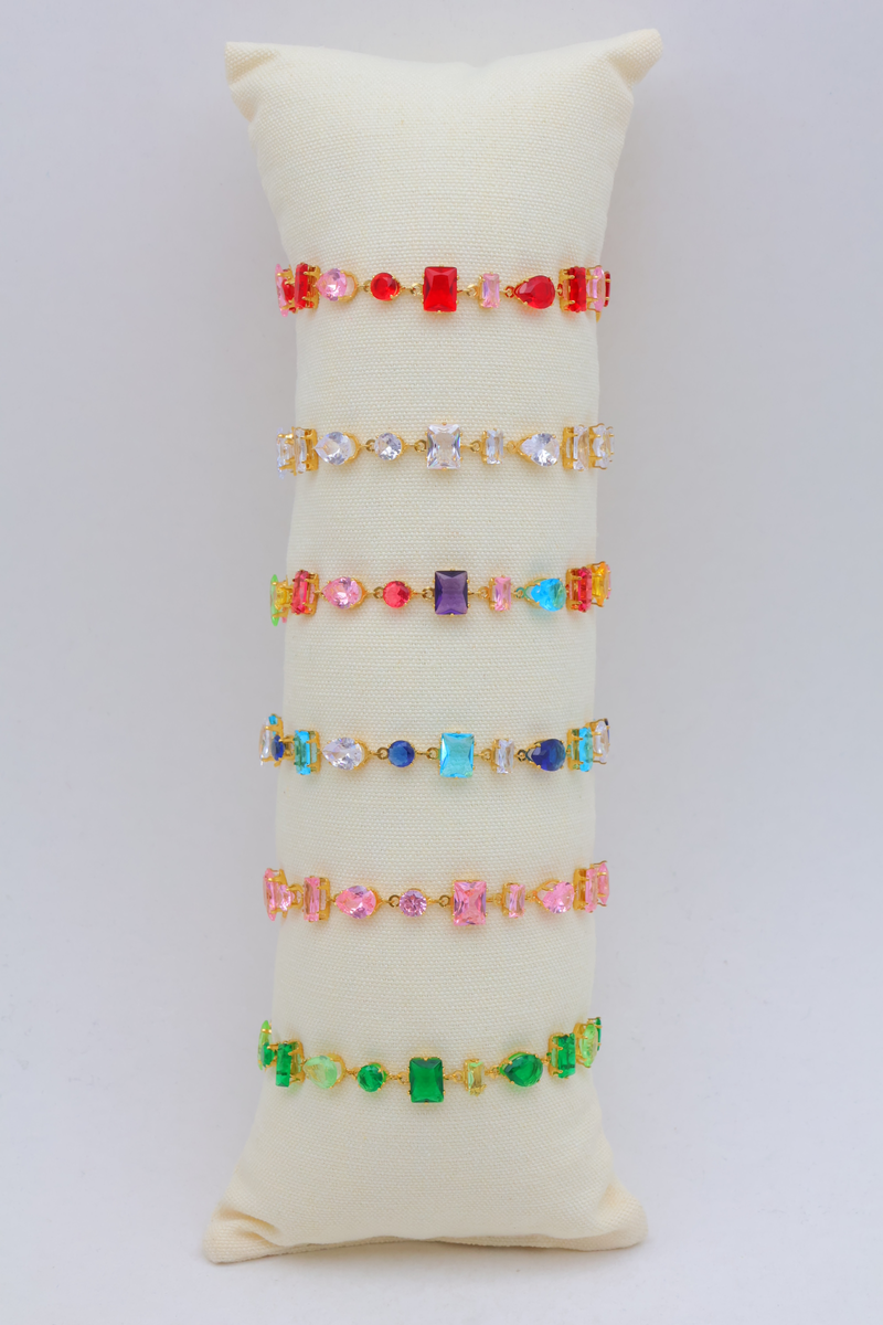 Set of 6 pearl-chain bracelets on cushion display — Multicolor