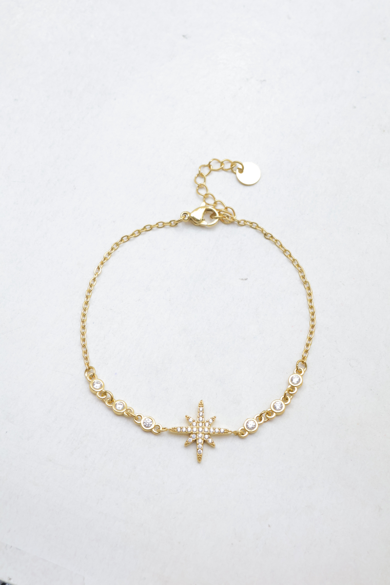 Edelstahlkette armband mit gepflastertem nordstern-design und runden strasssteinen