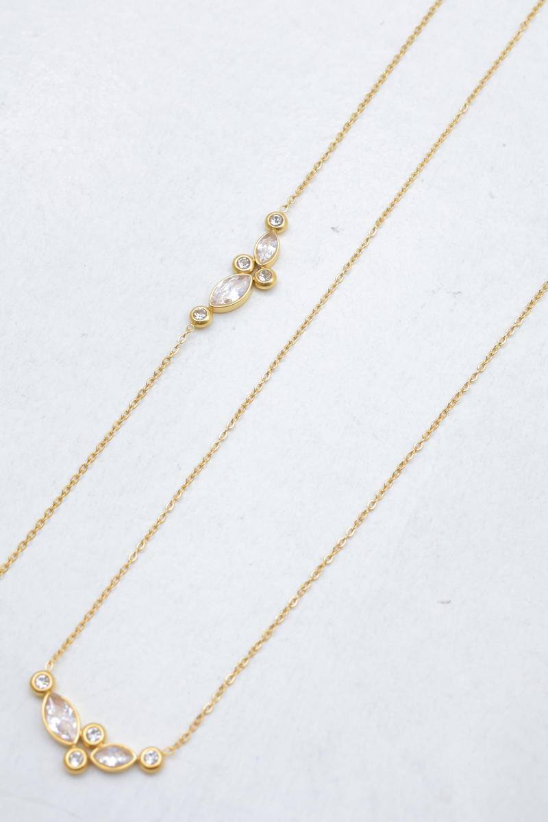 Edelstahl-set mit halskette und armband mit marquises-mustern und runden kristallen