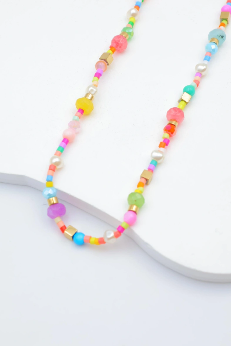 Necklace with colorful crystals, cylindrical stones, golden cubes and pearls — Multicolor