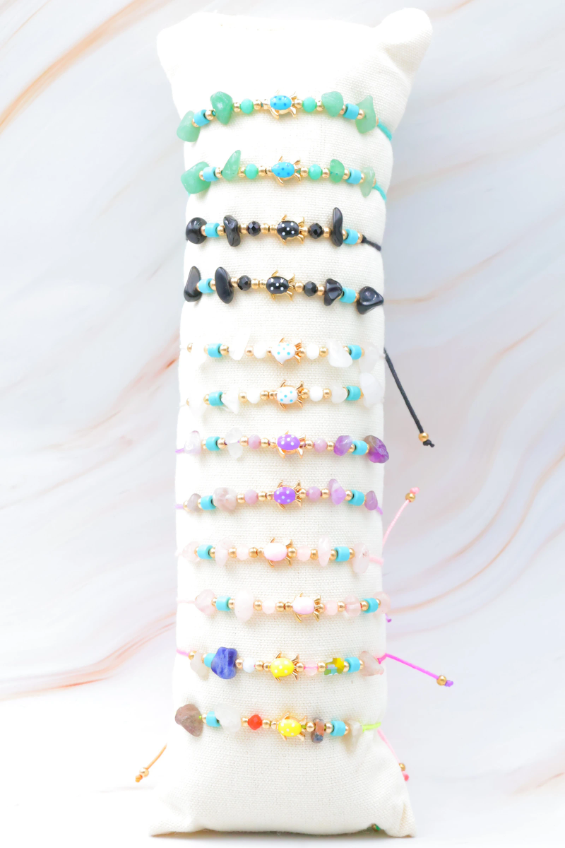 Lot de 12 bracelets en métal avec coussin — Multicolore