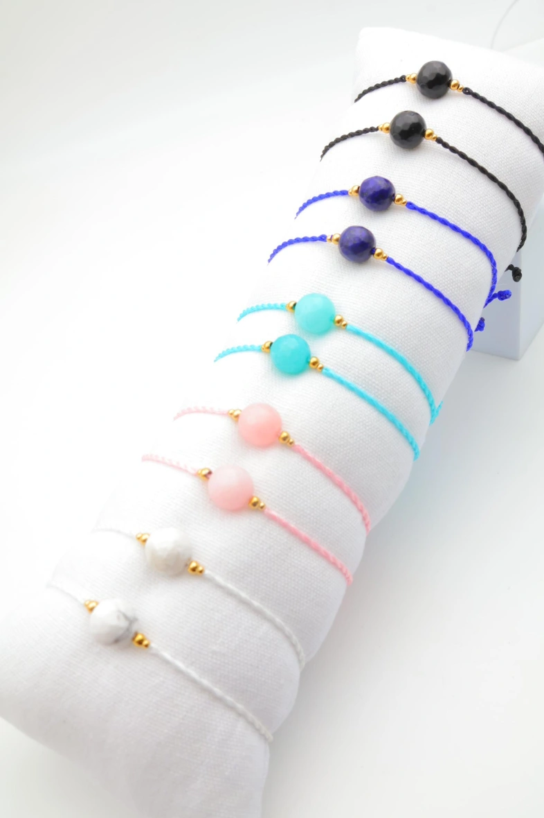 Lot de 12 bracelets en acier inoxydable avec coussin — Multicolore