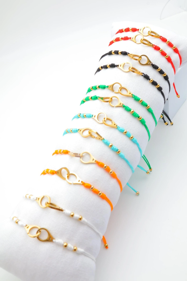 Lot de 12 bracelets en acier inoxydable avec coussin — Multicolore